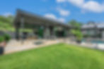 Wide angle view of a luxury home construction site in West Lake Hills